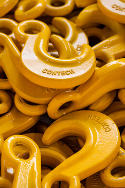 Container Technics fotografie product haken geel staand
